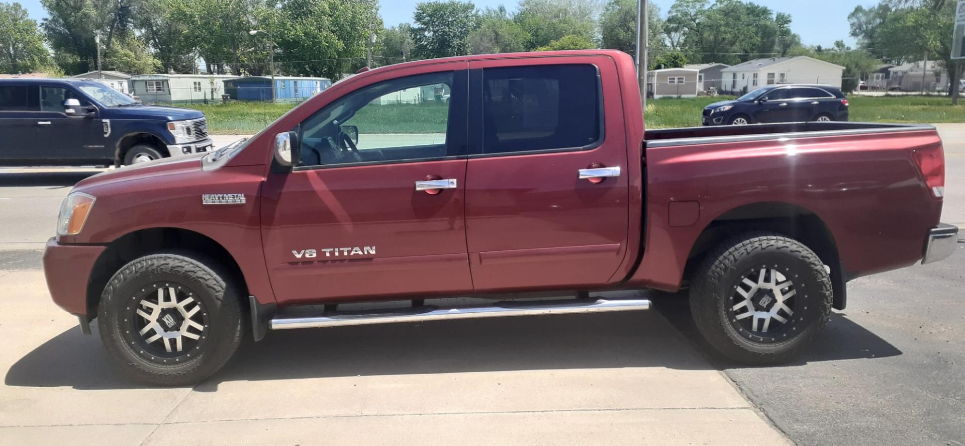 2014 Nissan Titan SV (1N6BA0EC1EN) with an 5.6 V8 engine, Automatic transmission, located at 2015 Cambell Street, Rapid City, SD, 57701, (605) 342-8326, 44.066433, -103.191772 - CARFAX AVAILABLE - Photo#0